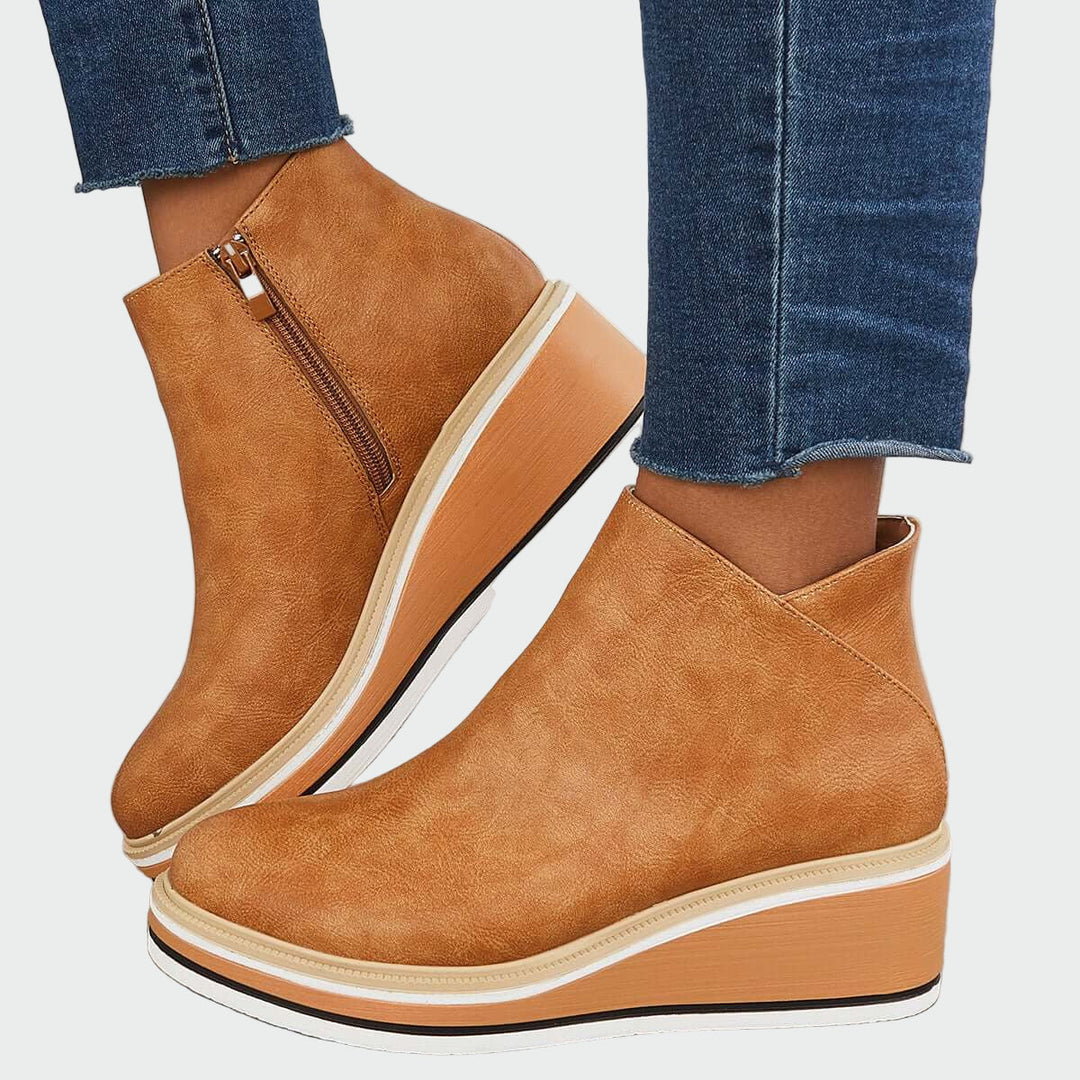 Ortopeedilised nahast saapad mugavuse ja toe jaoks.