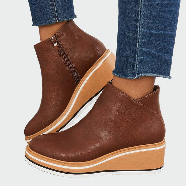 Ortopeedilised nahast saapad mugavuse ja toe jaoks.