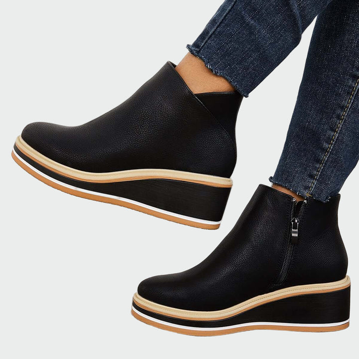 Ortopeedilised nahast saapad mugavuse ja toe jaoks.