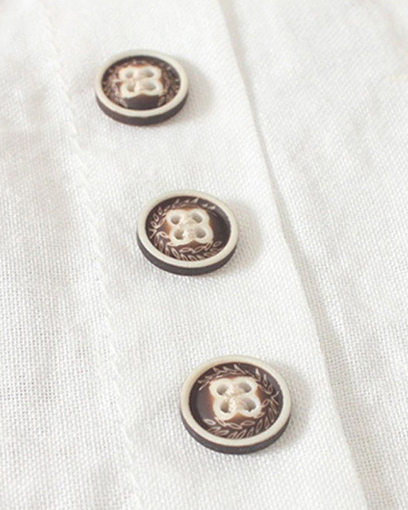 Nööpidega lühikeste varrukatega stiilne pluus