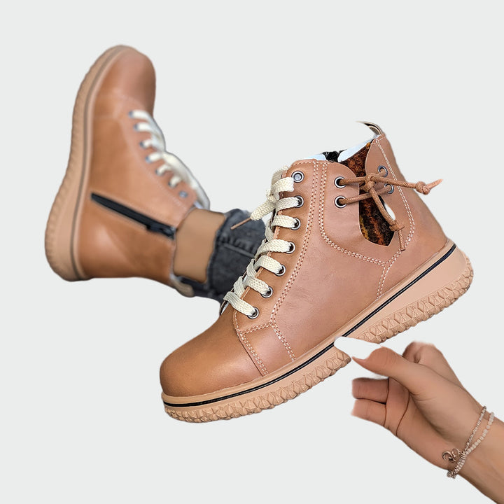 Ortopeedilised nahast poolsaapad mugavuse ja toe jaoks.