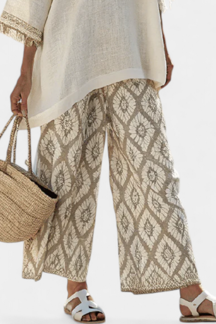 Boho šikk karikakarde komplekt: stiilne pikk pluus ja püksid.