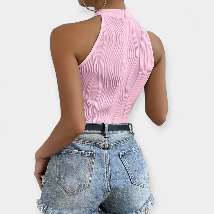 Volangidega ühes tükis kehakate elegantseks stiiliks.