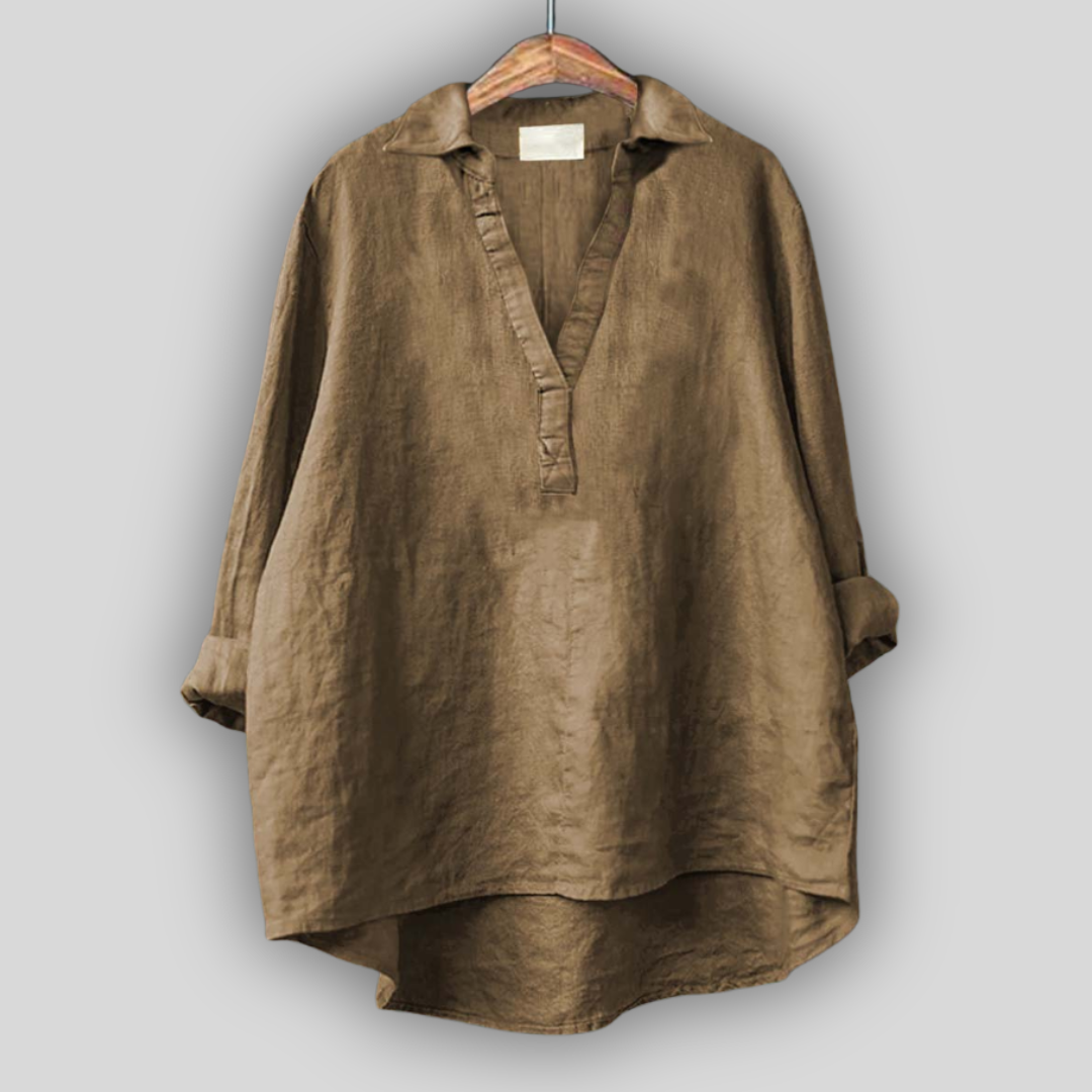 Valge linane pluus V-kaelusega mugavuseks.