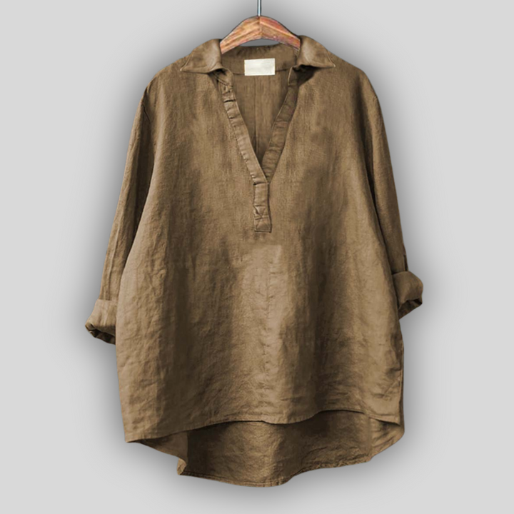 Valge linane pluus V-kaelusega mugavuseks.