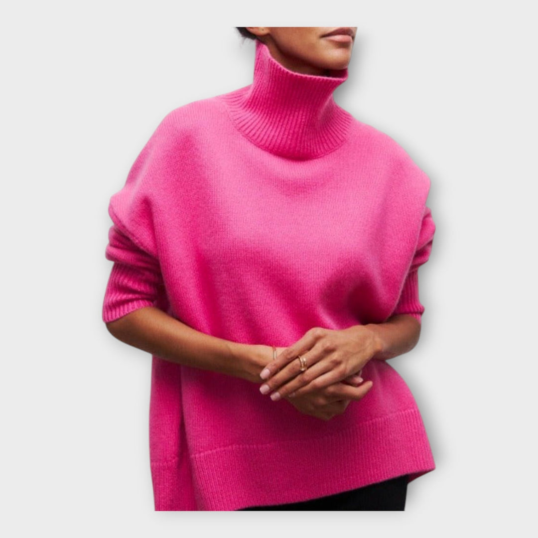 Kootud kampsun kõrge kraega mugavuse ja soojuse jaoks.