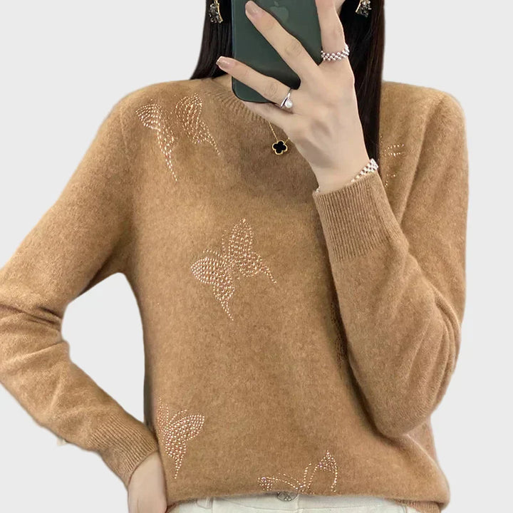 Kootud kilpkonn liblikamustriga soe ja stiilne.