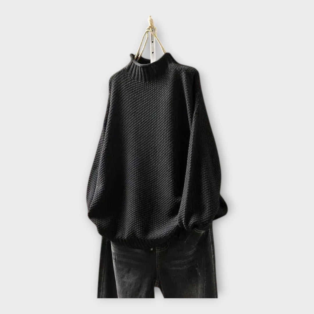 Kootud kampsun kõrge kraega mugavuse ja soojuse jaoks