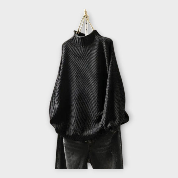 Kootud kampsun kõrge kraega mugavuse ja soojuse jaoks