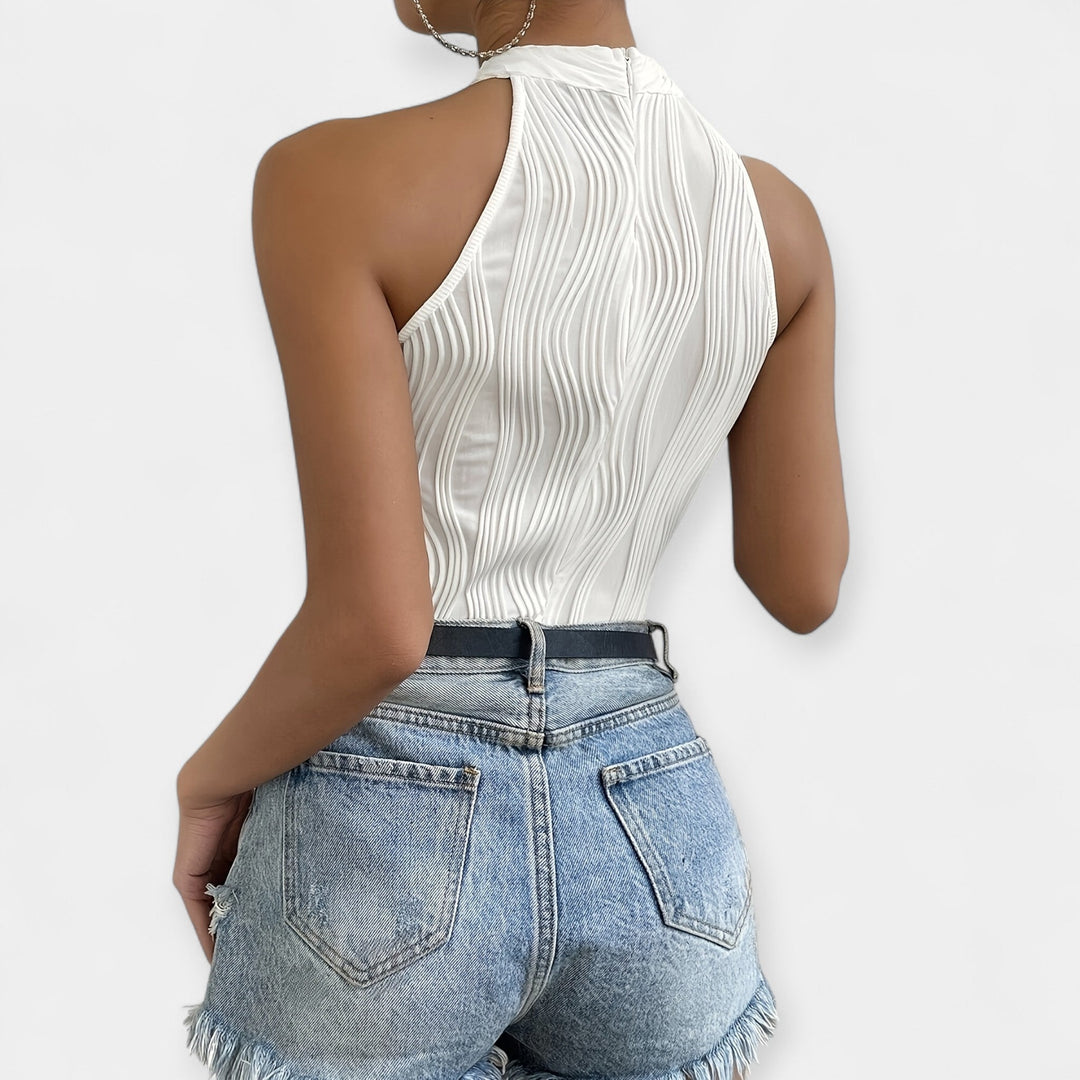 Volangidega ühes tükis kehakate elegantseks stiiliks.