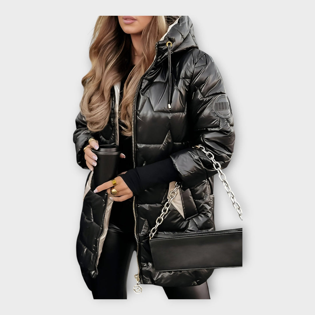 Kapuutsiga sulgepe soe ja mugav rõivastus.