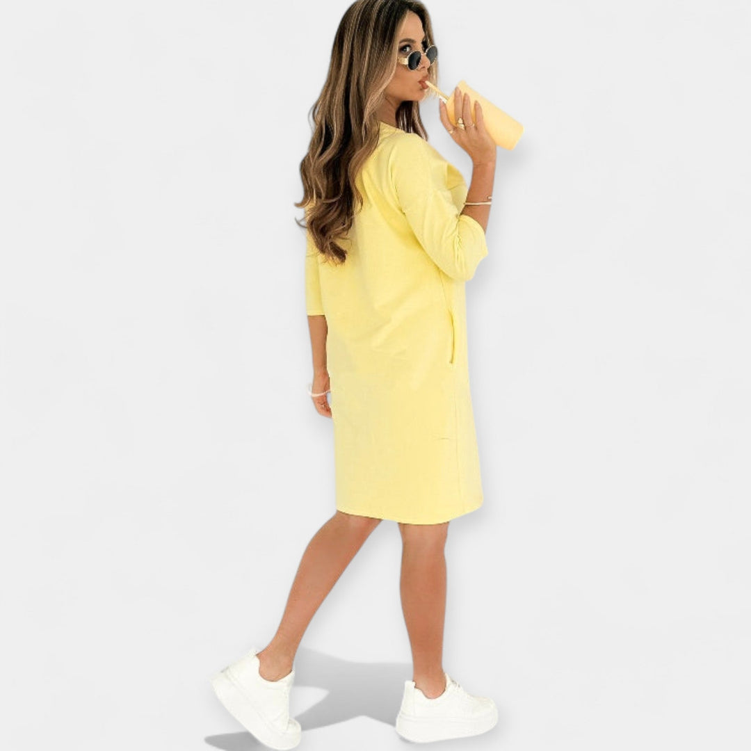 Vabaaja kleit mugavate taskutega